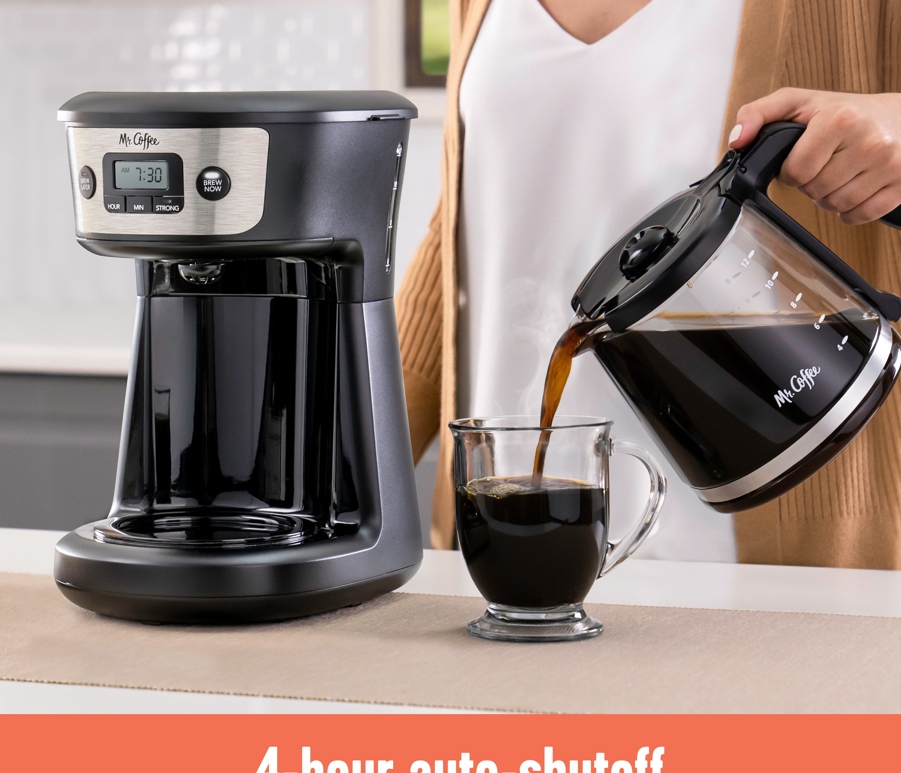 Model pouring coffee from black coffee machine