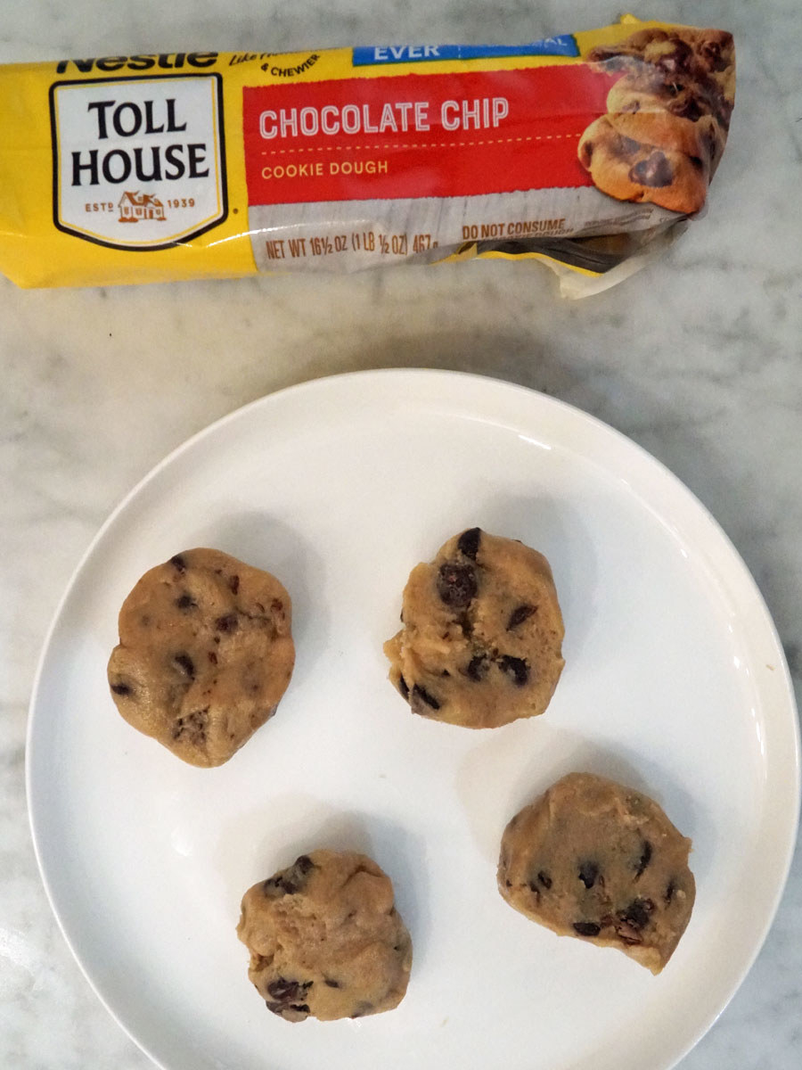 Toll House chocolate chip cookie dough balls next to the packaging.