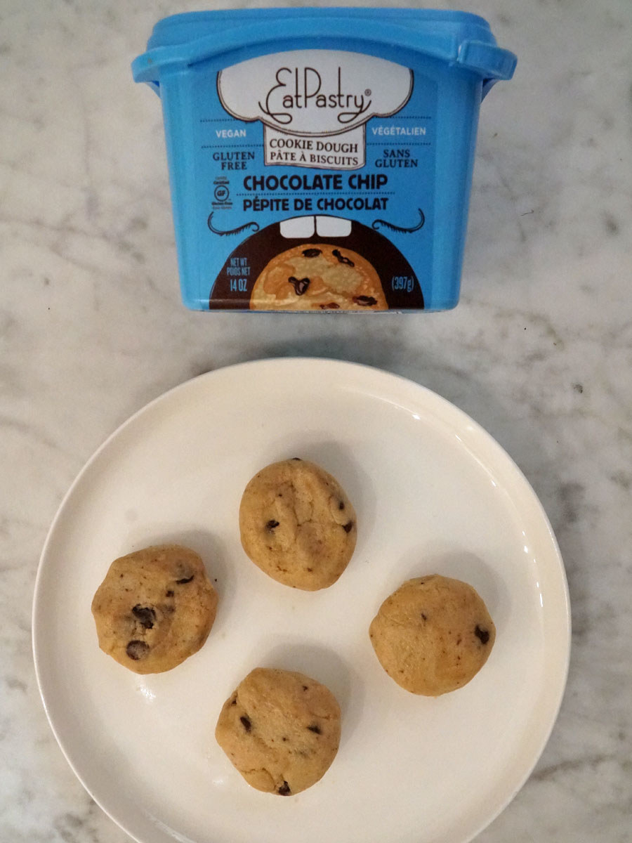 EatPastry chocolate chip cookie dough balls next to the packaging.