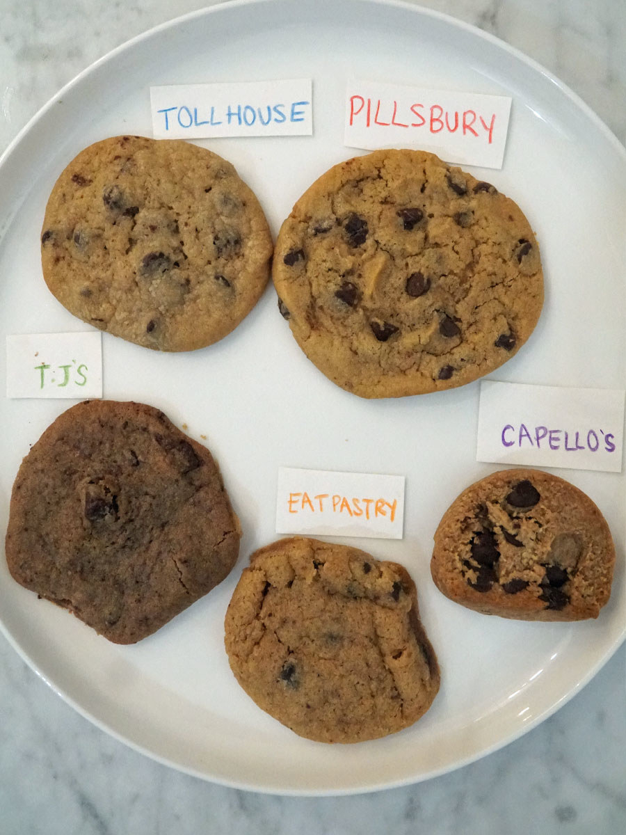 Five baked cookies on a plate