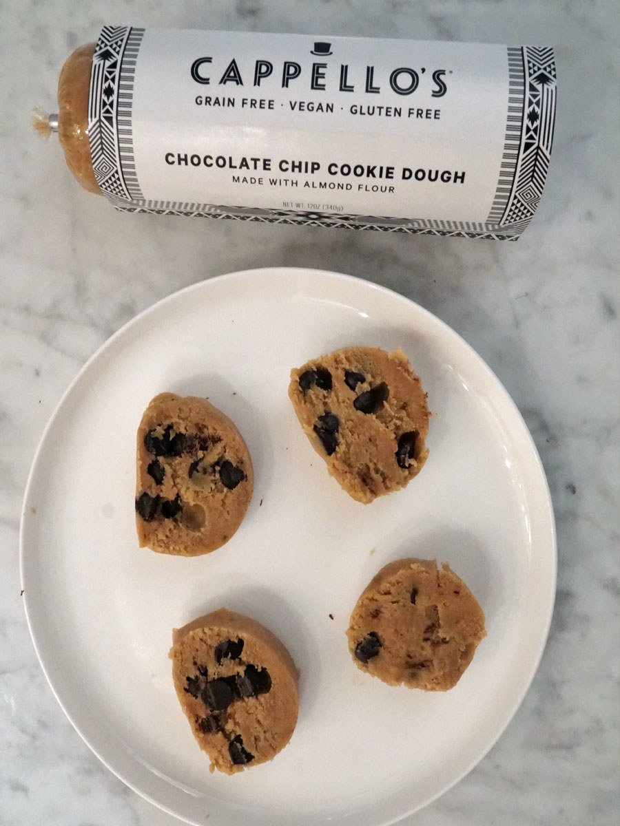 Cappello&#x27;s chocolate chip cookie dough balls next to the packaging.