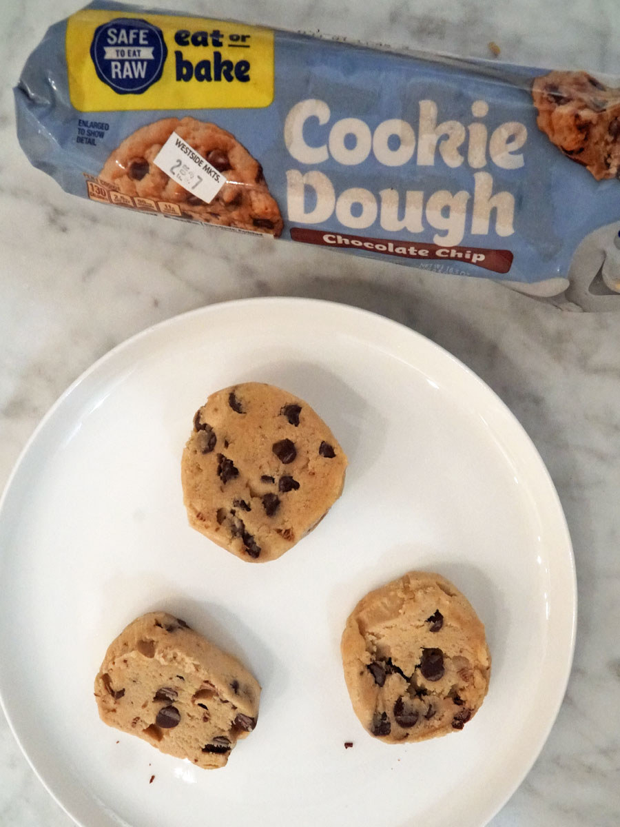 Pillsbury chocolate chip cookie dough balls next to the packaging.