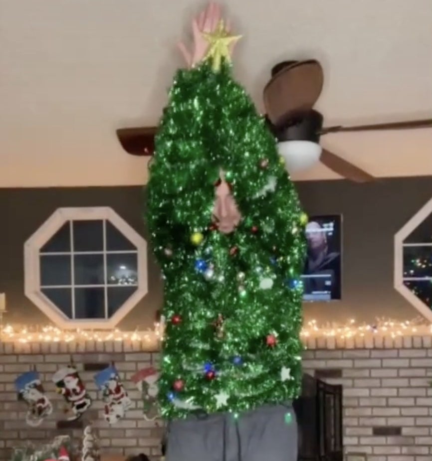 A sweater made entirely of green tinsel