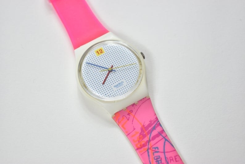 A hot pink Swatch Watch