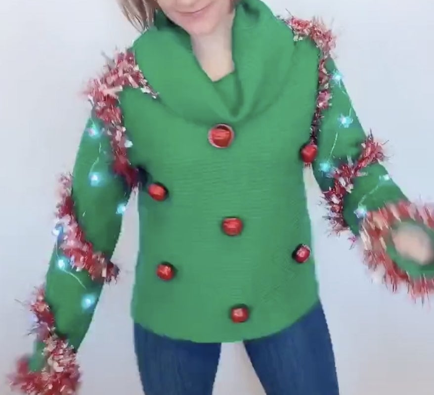 A sweater covered in bells and tinsel