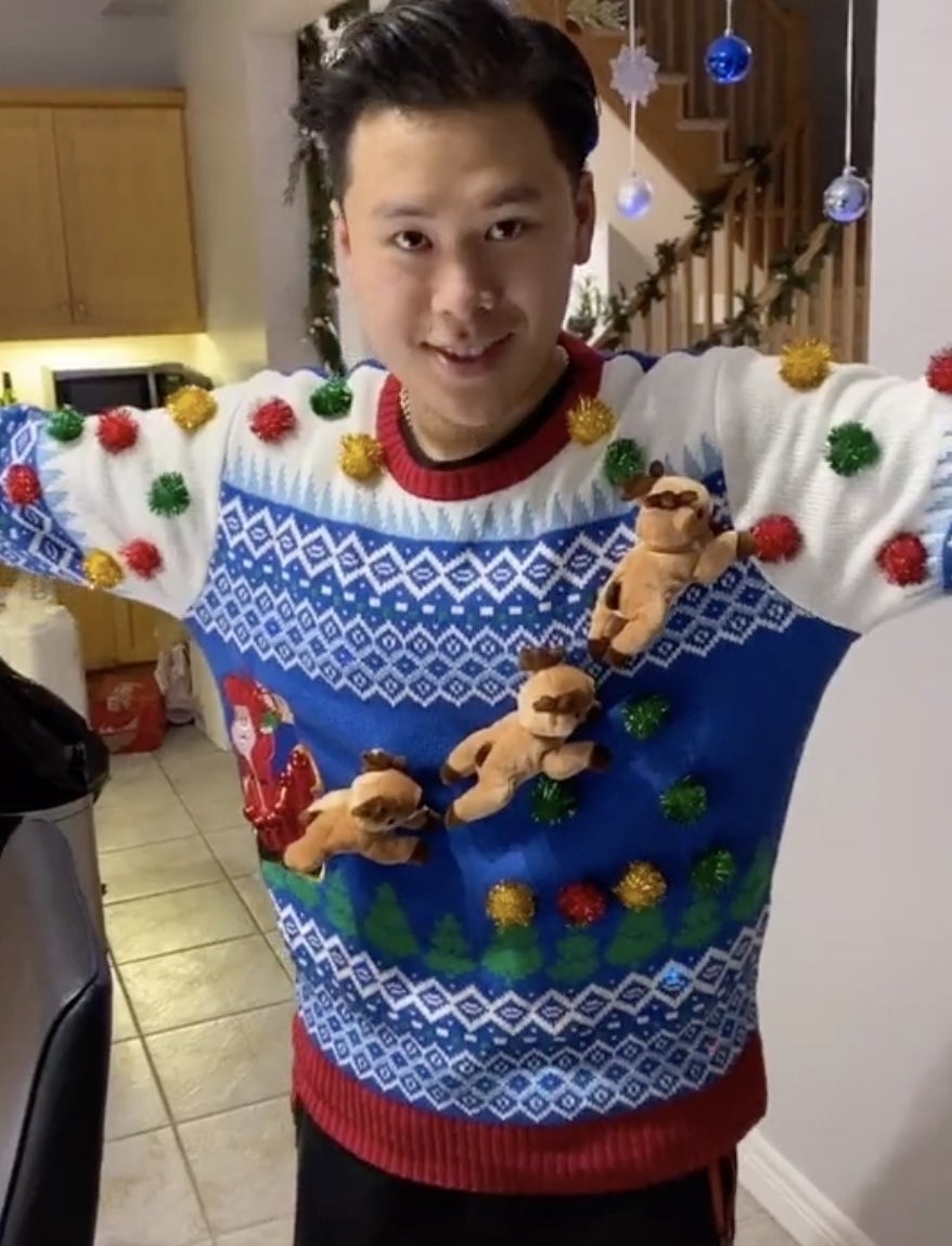 A sweater with 3D reindeer
