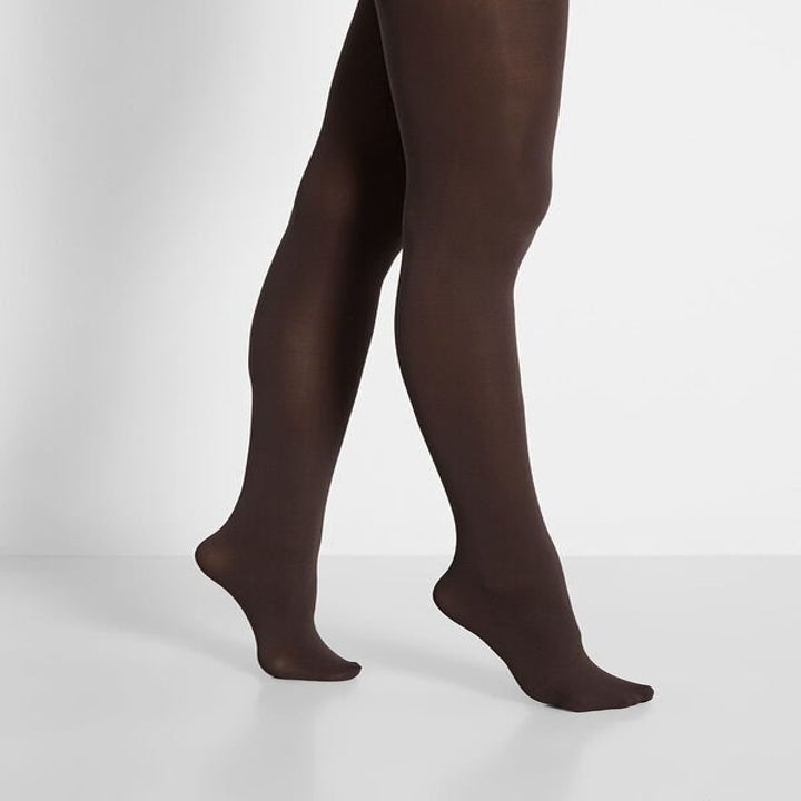 a model wearing the tights in chocolate color