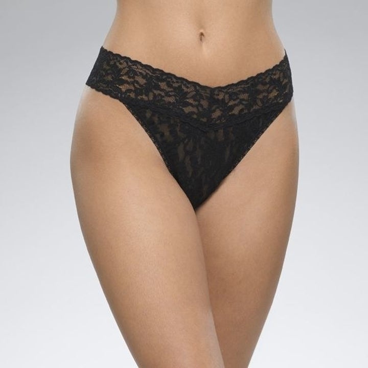 a model in black lace underwear