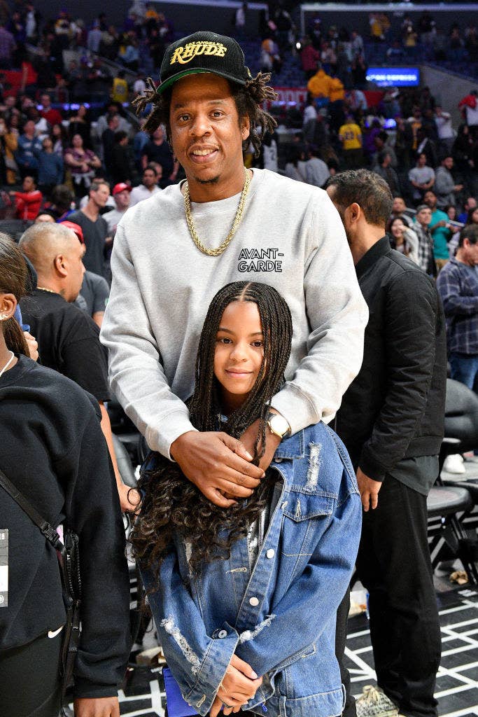 Blue Ivy and Jay-Z at a basketball game