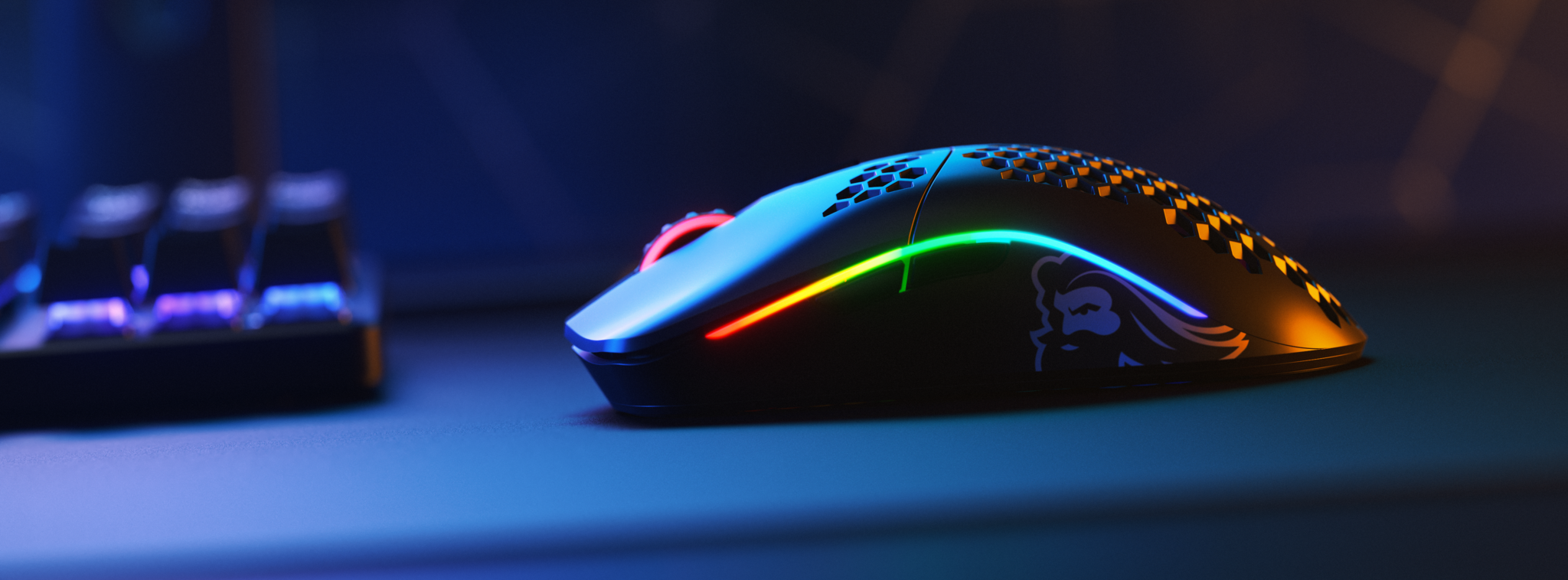 the black mouse with a rainbow led light on the side