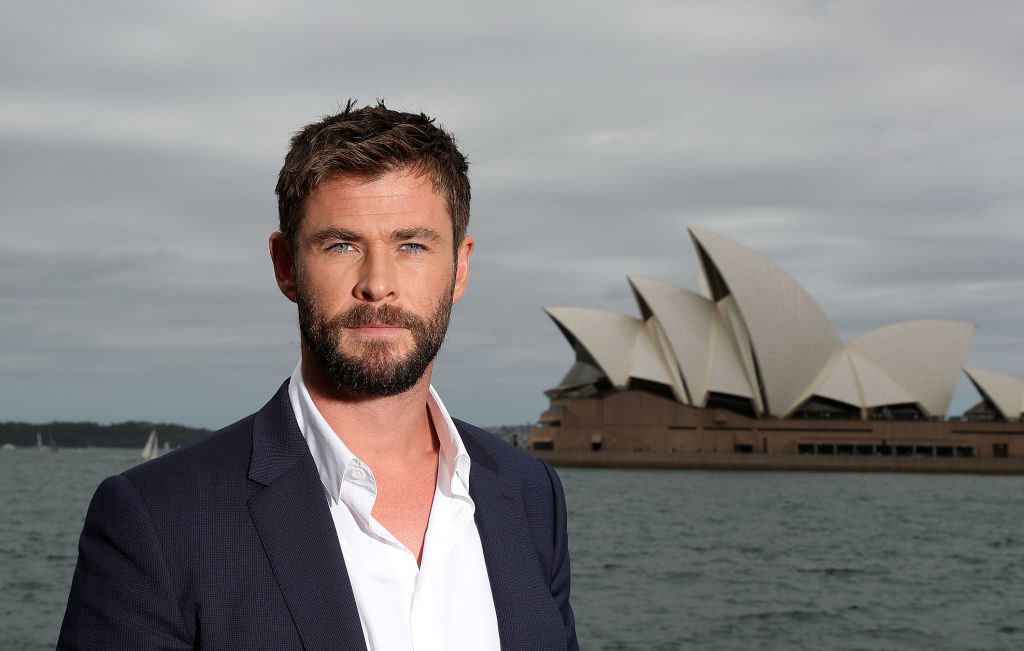 Chris Hemsworth with the Australian Opera House behind him