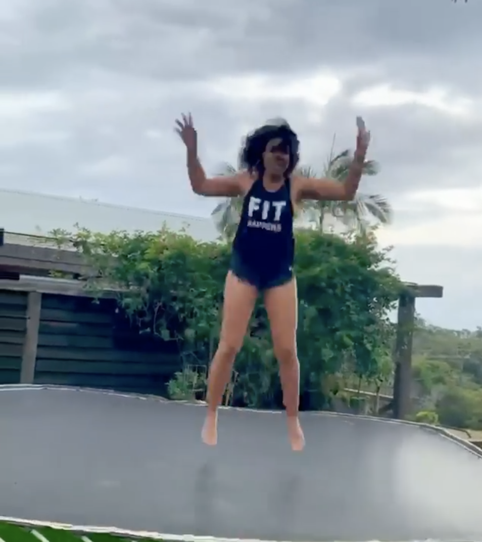 Regina jumping high on the trampoline
