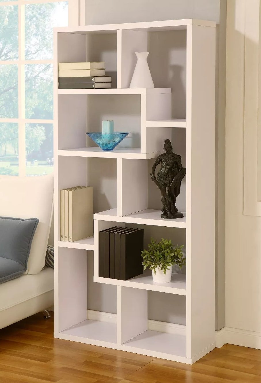 The white asymmentrical bookcase
