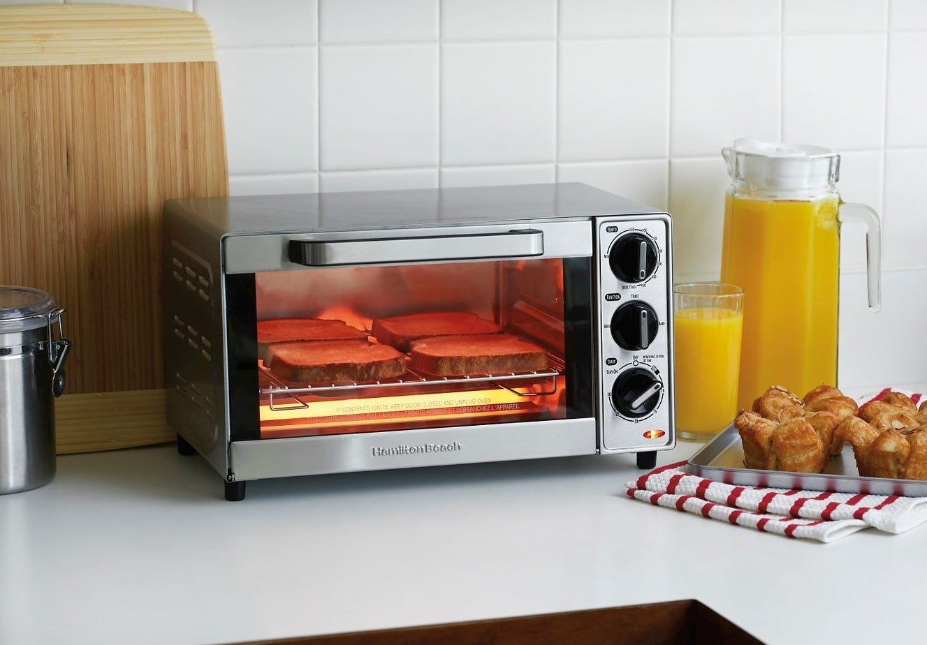 hamilton beach toaster oven with four pieces of toast