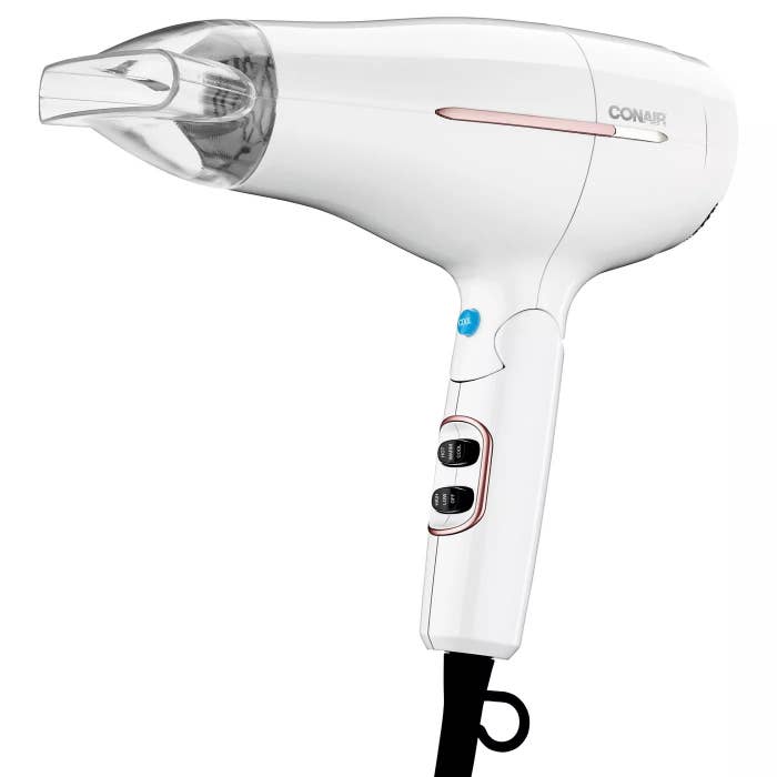 The white Conair blow dryer with the concentrator attachment