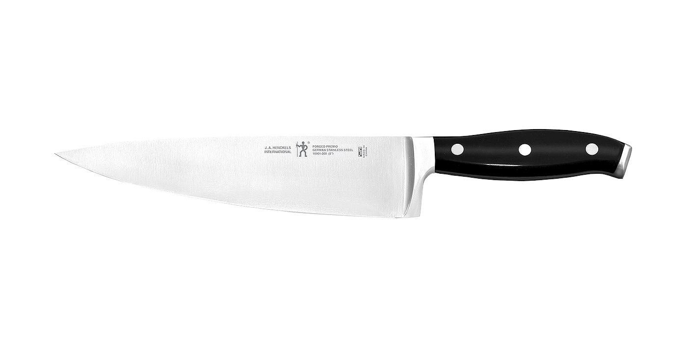chef's knife with a sharp blade and a black handle