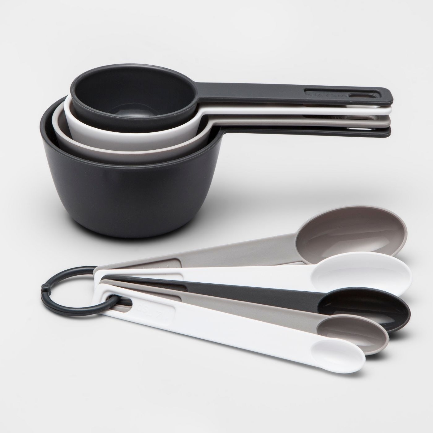 black and gray measuring cups and spoons