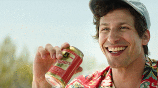 Andy Samberg drinking a beer in &quot;Palm Springs&quot;