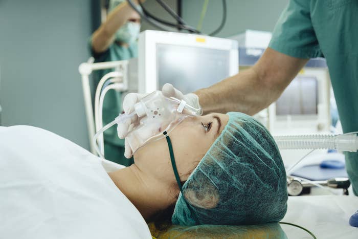 a patient with an oxygen mask on