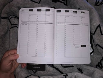 reviewer image of the smart planner pro open to a blank week 