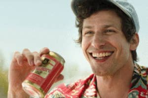 Andy Samberg holding a beer