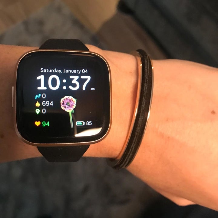 reviewer photo showing their wrist with a watch and the hair tie bracelet 