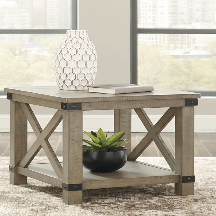 Cube-like taupe end table with lower shelf 