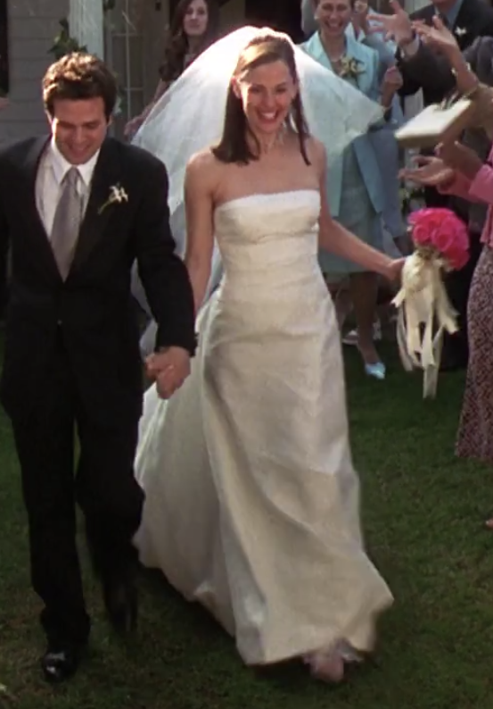 Jenna in an a line straight neckline strapless simple wedding dress