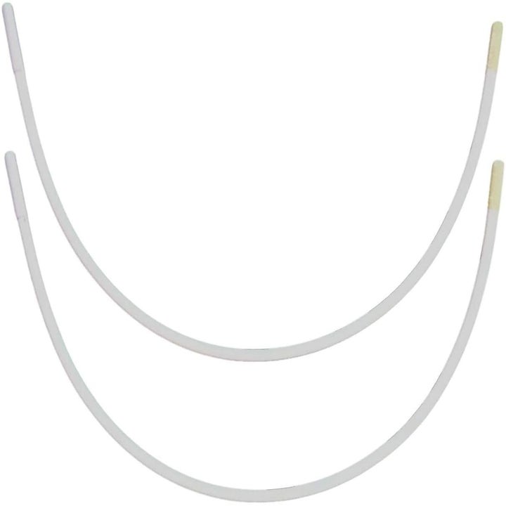 A pair of white replacement bra underwires 