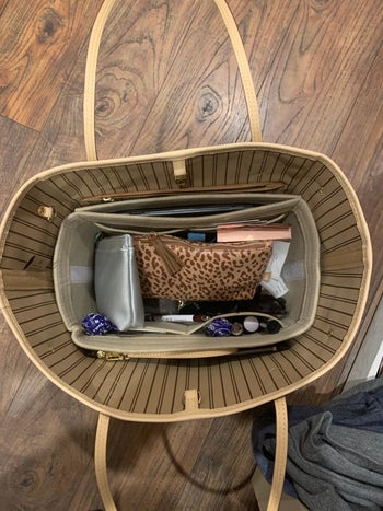 reviewer image of the purse organizer insert inside of a customer's tote bag