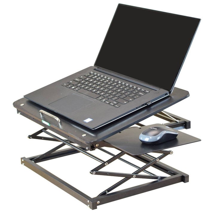 Laptop on the extended stand with a place for the mouse