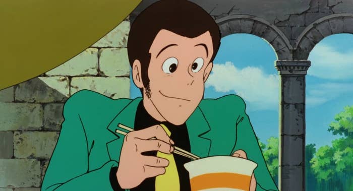 Lupin III enjoys a meal during a stakeout.