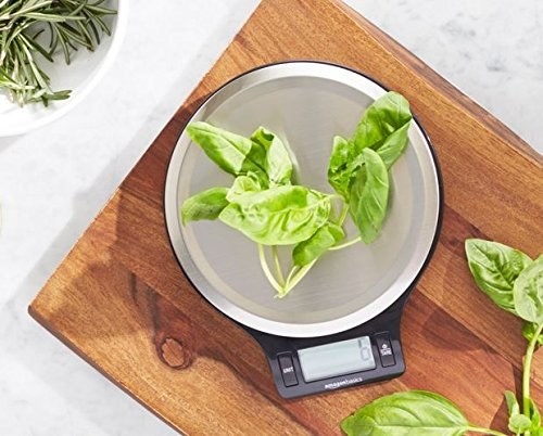 spinach leaves on weighing scale