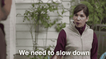 Carrie Brownstein in Portlandia tells someone to slow down. 
