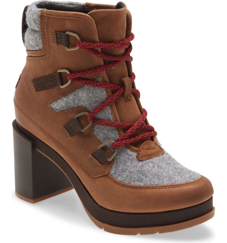 The lace-up boots in brown with gray accents and red laces