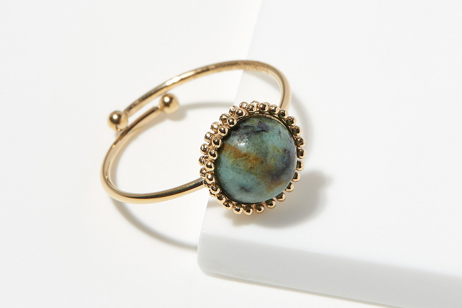 A ring with a large stone at the center