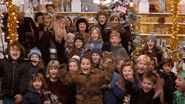 GIF of excited children and Will Ferrell from the movie Elf 