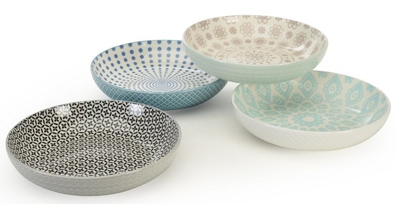 Four salad or pasta bowls with different colored patterns 