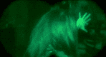 Buffalo Bill reaching for Clarice&#x27;s head with night vision goggles on