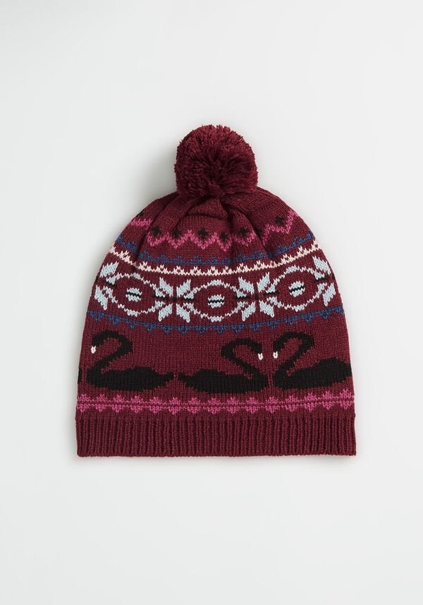 a burgundy hat with black swans printed on it