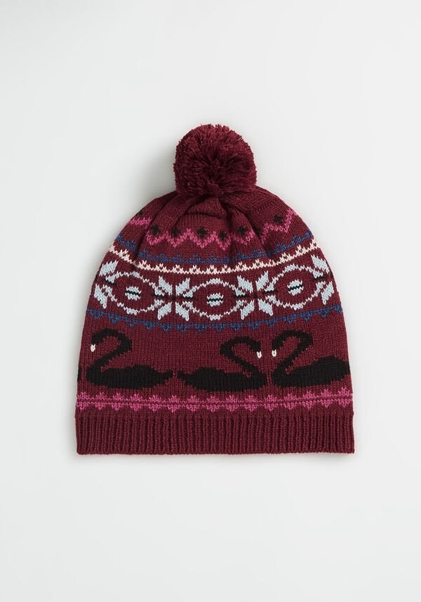 a burgundy hat with black swans printed on it 