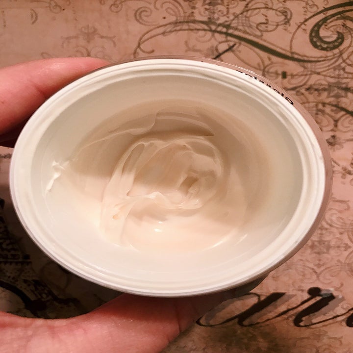 The moisturizer inside of the jar