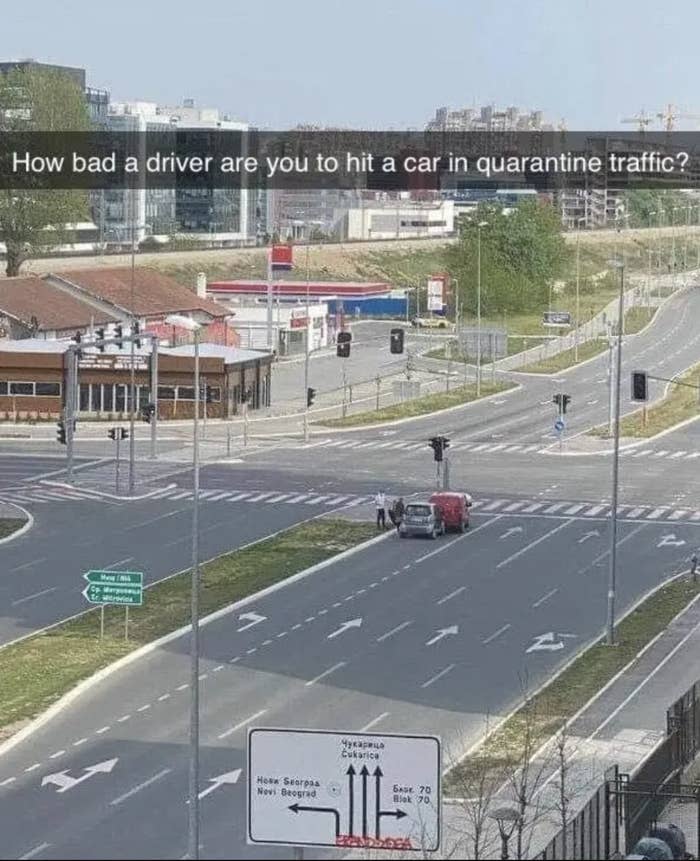 a far away picture of a two car crash during quarantine traffic