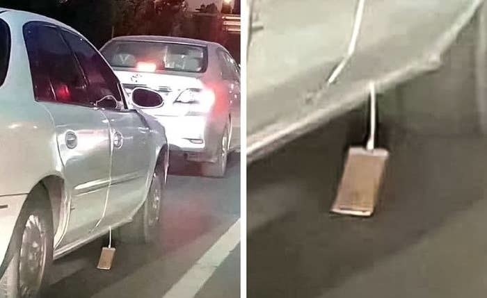 iphone dragging by its cord outside a car