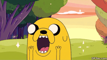 Jake from &quot;Adventure Time&quot; with an excited face and sparkles around him