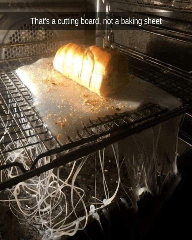 bread on top of a cutting board thats melting in the oven