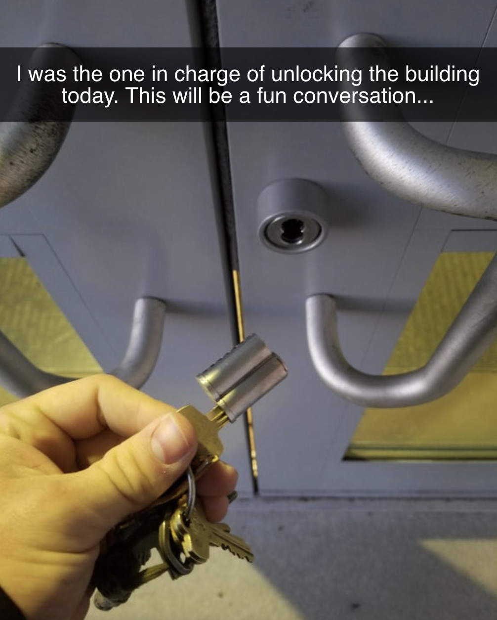 person who tried to open a door but the whole lock came out