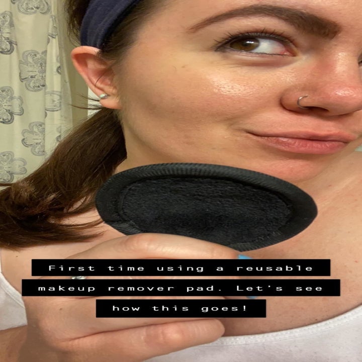 Reviewer's face with foundation and eyeliner before using a reusable makeup remover pad