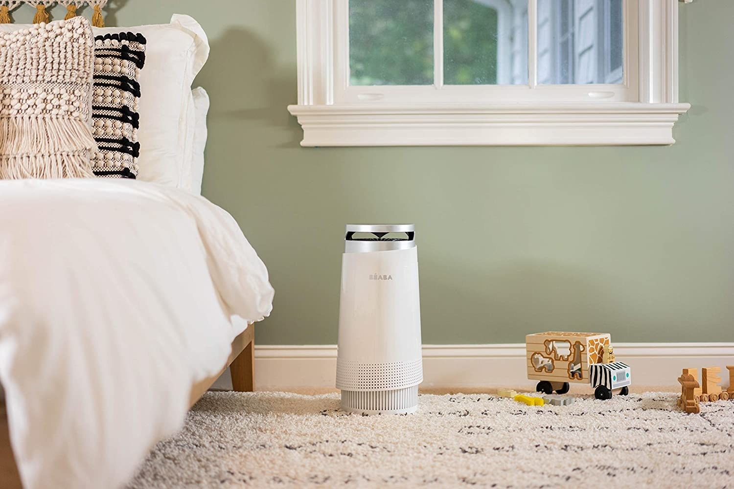 A white air purifier unit.