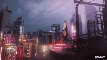 Kai stands on a ledge in a futuristic world as he sings
